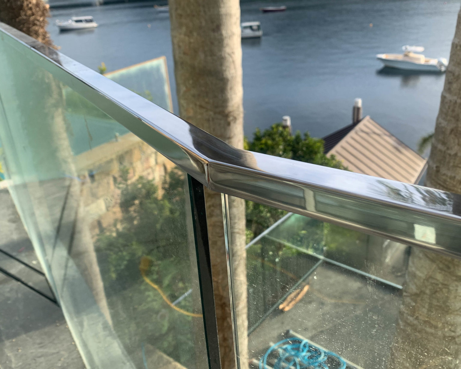 glass balustrade balcony join corner weld polish stainless steel
